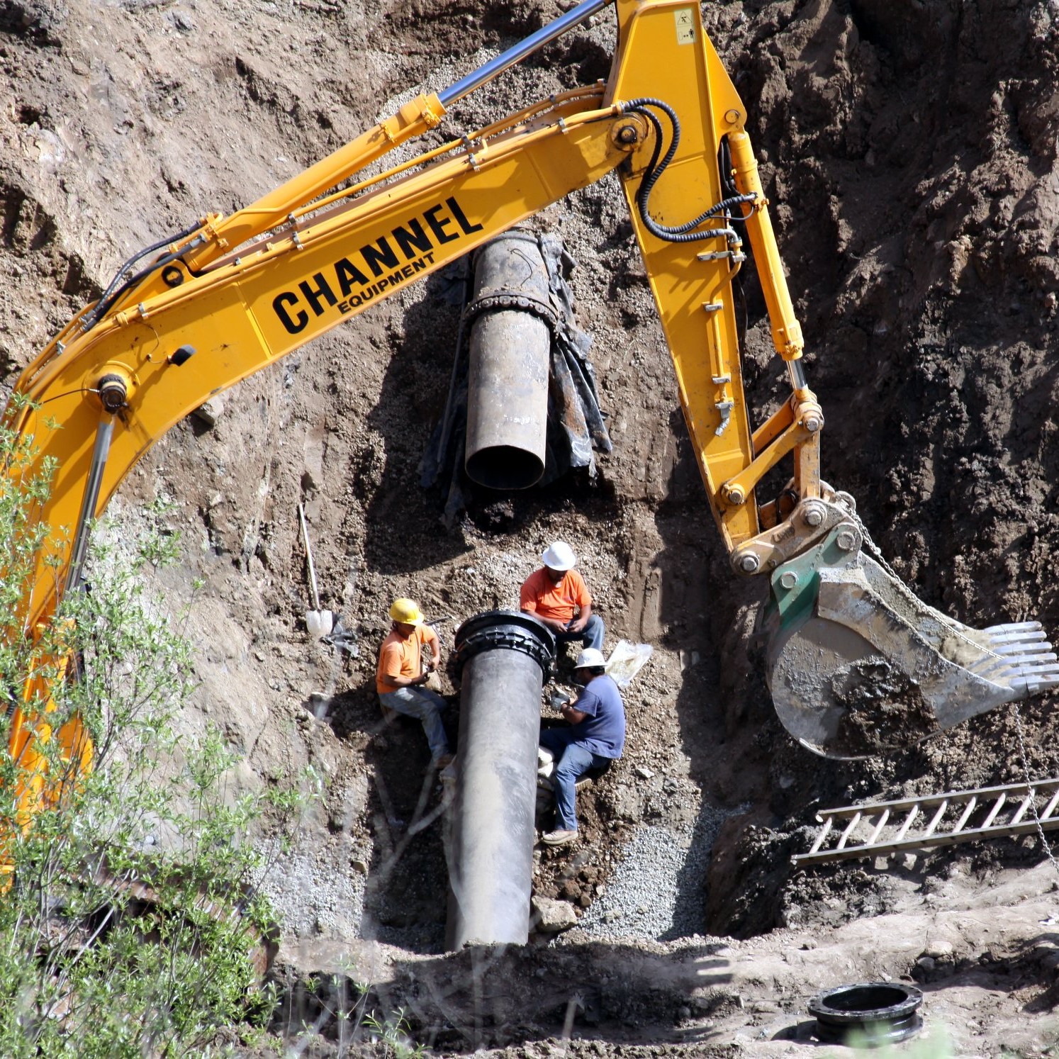 Pipe being repaired